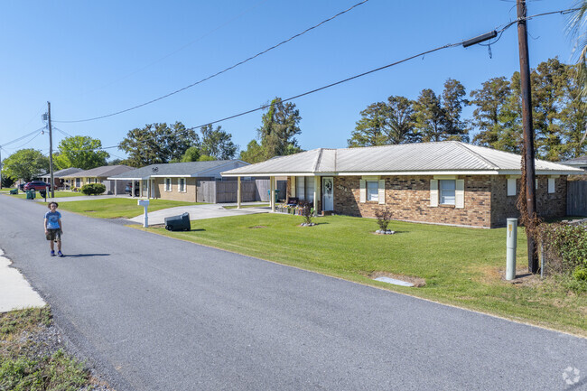 Brick Ranch style homes like these are a very common sight in Cut Off.