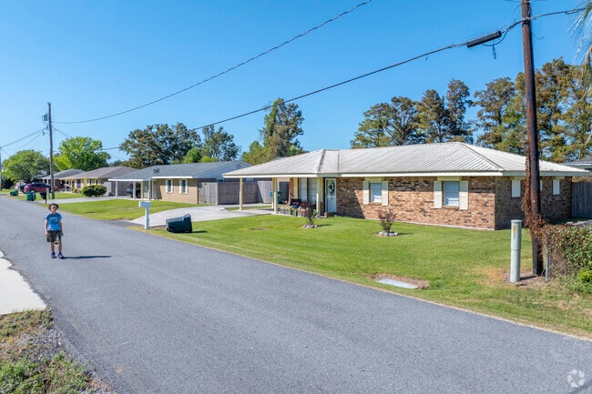 Brick Ranch style homes like these are a very common sight in Cut Off.