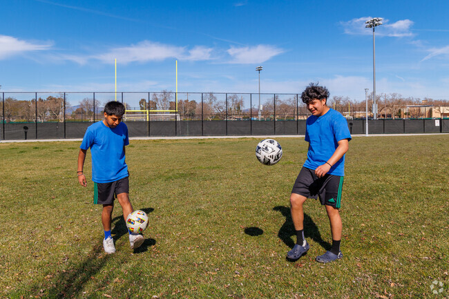 Pheasant Ridge residents enjoy a sunny soccer session at Bernal Community Park.