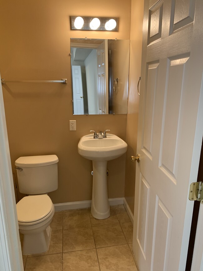 View of 1/2 bath near kitchen area