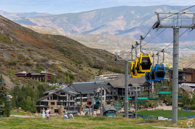 Gondolas at Snowmass offer easy access to slopes and alpine views.