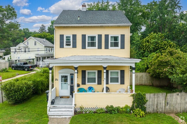Vintage Falls Township homes echo early‑1900s streets near the Delaware River.