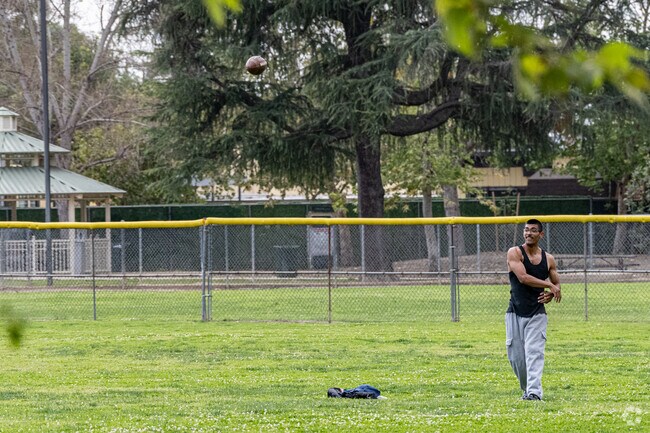 Locals enjoy playing football and other sports at Lambert Park in the Norwood Cherrylee neighborhood of El Monte.