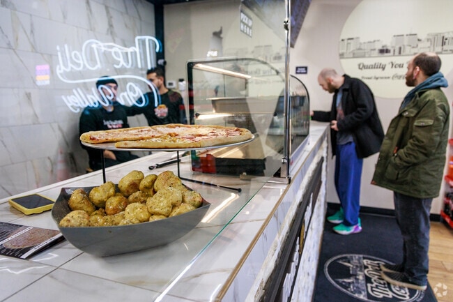 The Deli On Valley serves up pizza, sandwiches, and local flavor right in the heart of Elmwood.