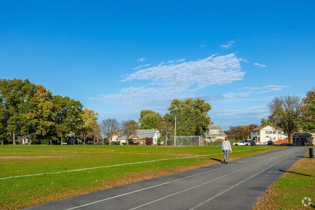 Cooney Field features a perimeter track for walkers and green space for soccer or baseball.