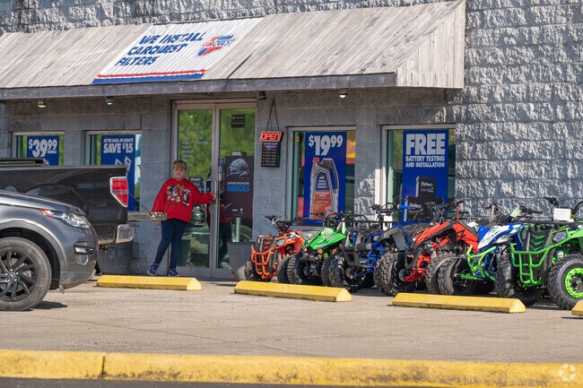 Stop at the Autoparts store that offers many outdoor motorcycles to enjoy in Odneville.