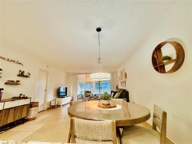 8350 Sands Point Blvd unit 104E, Tamarac, FL 33321 - photo 4