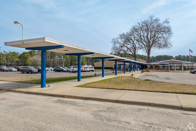 There is a large drop-off, pick up and bus rider areas for West Oxford Elementary School students and their families.