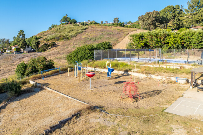 There is a larger playground for students at Revo Academy.