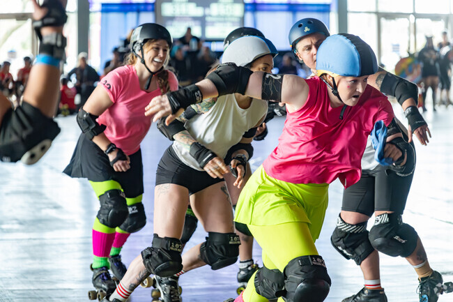 The pivot skater breaks free from blockers to score a point at the Tomato Jam in West Vallejo.