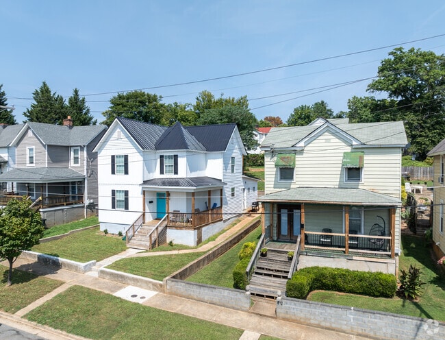 A row of homes in Lakeside features one with a bright blue door.