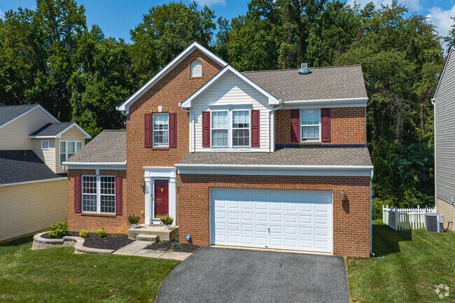 Many Colonial homes in Havre De Grace come with attached garages and sizable yards.
