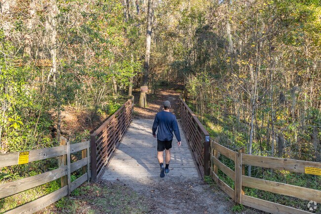 Cofrin Nature Park features a forested area with a half-mile hiking trail & wetlands fed by Beville Heights Creek.