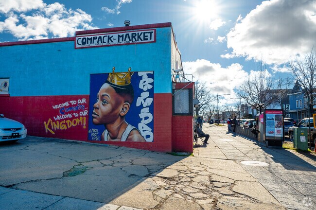 Jabbo's Market features a stunning mural on the side celebrating the neighborhood of Trinidad.