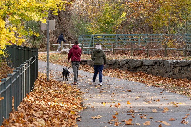 Residents of Lincoln enjoy walking through the pathways of  Blackstone River Park.