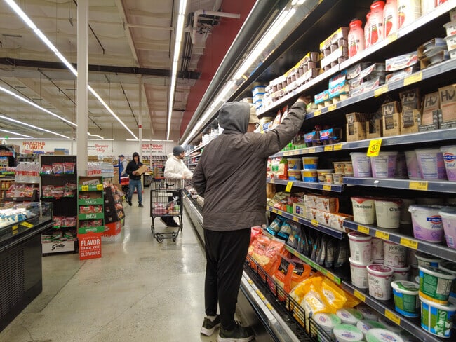 Exploring the bargains at Grocery Outlet in the vibrant Avenida España neighborhood.