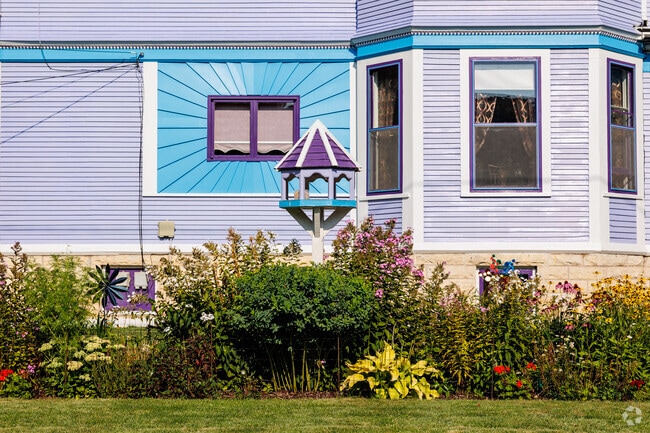 Residents in Old Third Ward adorn their homes with landscaping and bird houses.