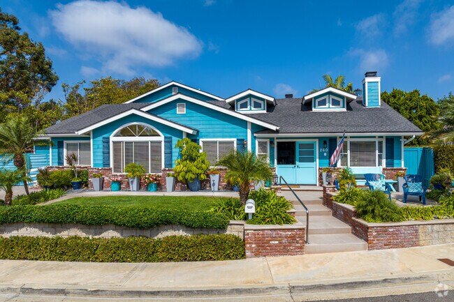 This beautiful cap code design inspired home has vivid colors.