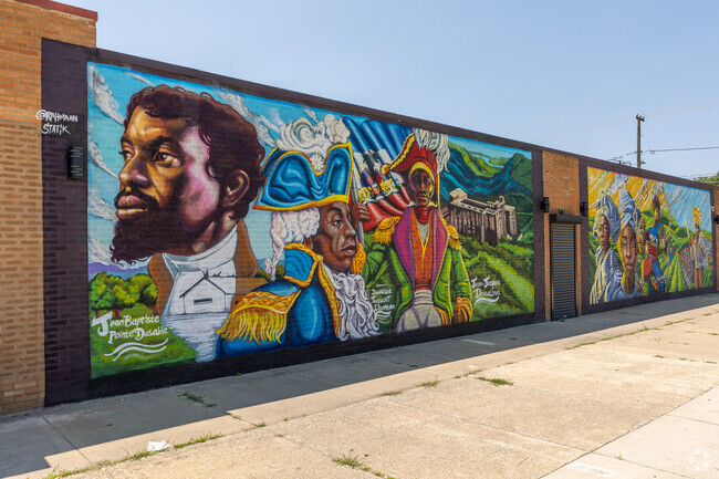 The mural of Jean Baptiste Pointe Dusable by Rahmaan Statik is iconic to the Roseland community.