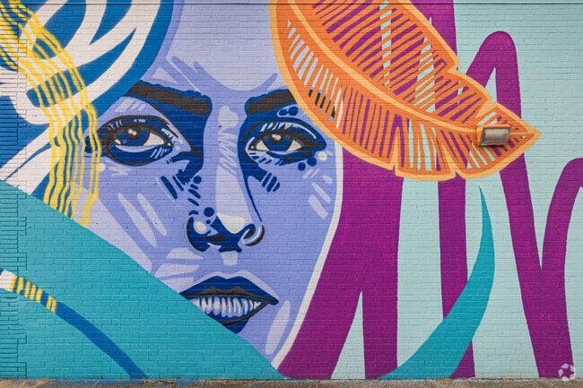 A mural in Carolina Place mimics the vibrant colors of the neighborhood.