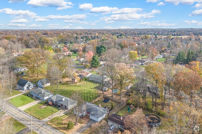 There are many beautiful homes and green spaces in Cortland.