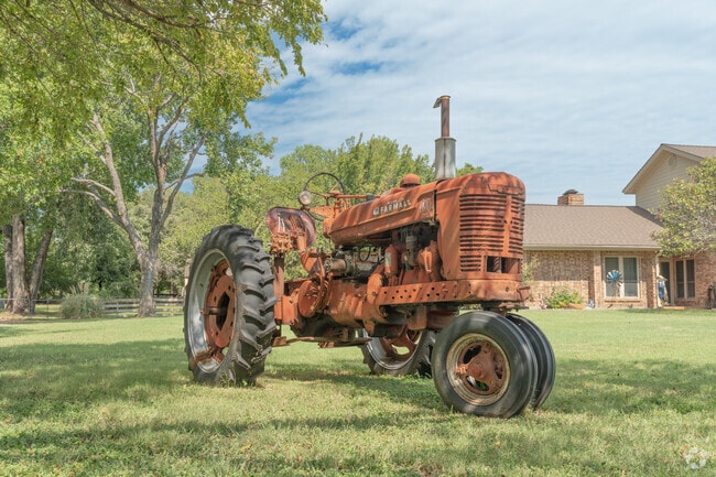 In Double Oak, large yards often double as workspaces for tractors and garden tools.