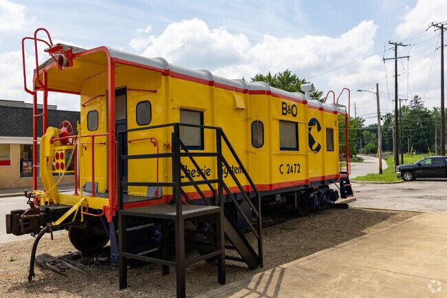 A bright yellow caboose at Main and Railroad streets honors Riverton’s historic railroad roots.
