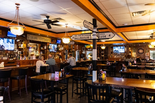 The Irish Cottage features a traditional bar and spacious seating.