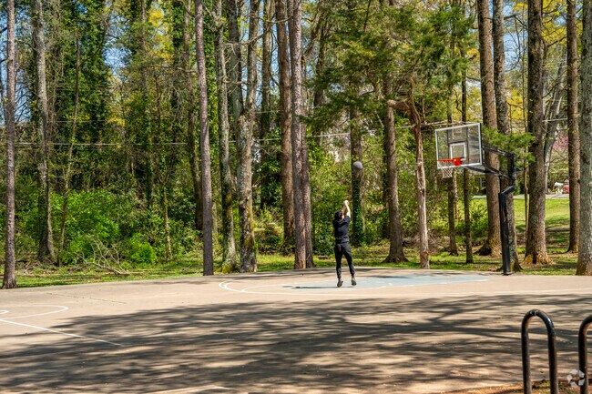 There are a variety of sport facilities at Carmel Road Park like the outdoor basketball court.