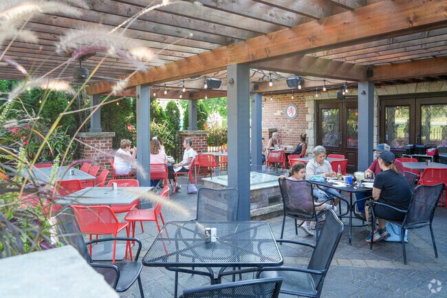 The patio at The Village Squire is perfect for unwinding after work in Plato Center.