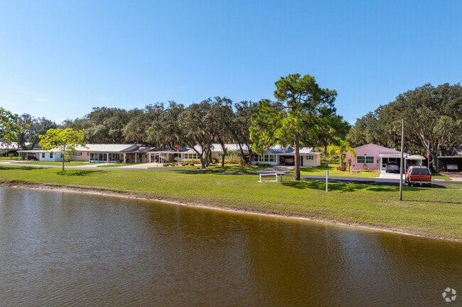 Rows of homes line the lakefront enjoy the nice waterfront views in Maranatha Village.
