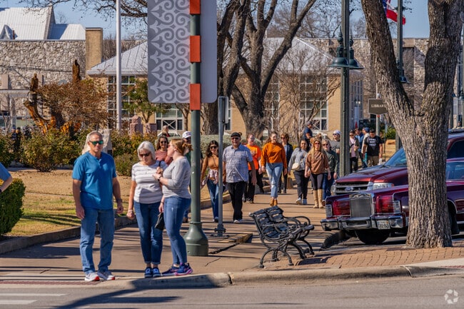 Visitors from all over stroll through the downtown area of Fredericksburg.