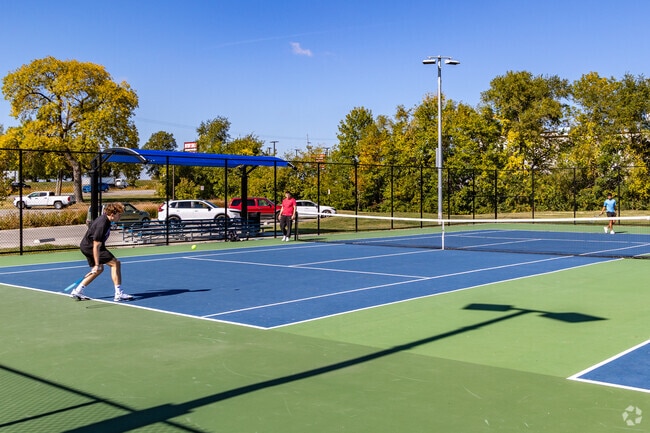 Summit Park offers tennis courts for a friendly match.