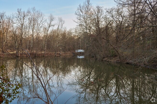 Washington Woods Park provides a wooded trail and playground for local residents to enjoy.