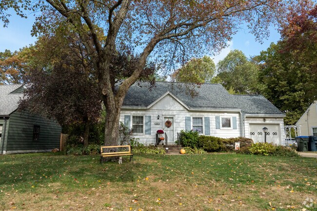 Located in the desirable River Estates neighborhood, this charming Cape Cod-style home features a single-car attached garage.