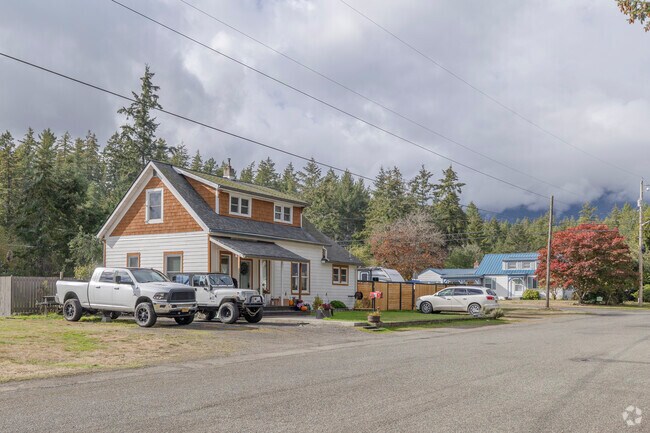 Lovely traditional style homes are found within the town of Quilcene WA.