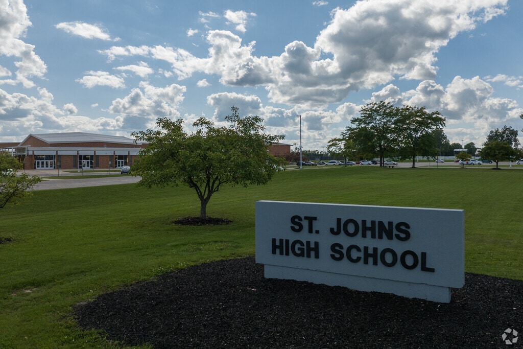 The main entrance sign to St. Johns High school in Clinton County.
