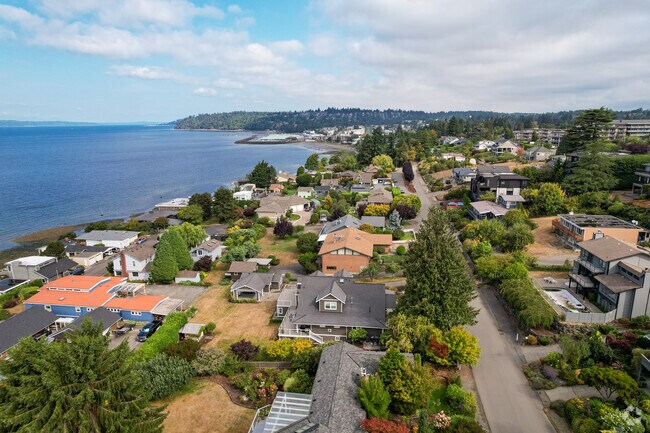 The Des Moines Mariner Sits in the Distance.