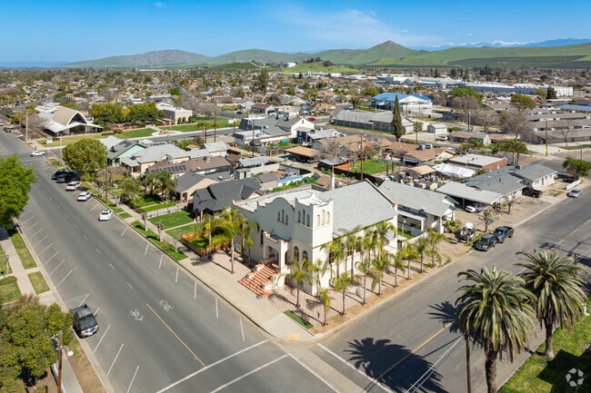 Rocky Hill and the Sierra Nevada mountains overlook the town of Lindsay.