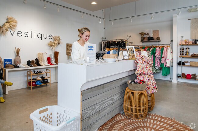 Peachtree Corridor boasts charming local boutiques like Vestique, adding personality and style to the Town Brookhaven shopping scene.