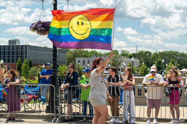 Pigeon Hill residents proudly take part in Aurora's Pride Parade in Downtown Aurora, IL.