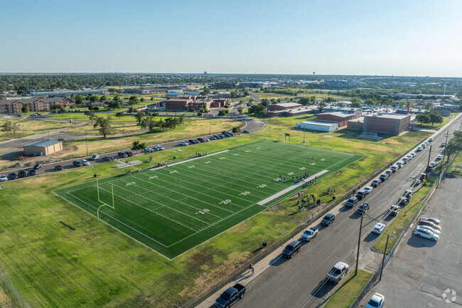 The Bowie Middle School football team plays on a pristine football field.