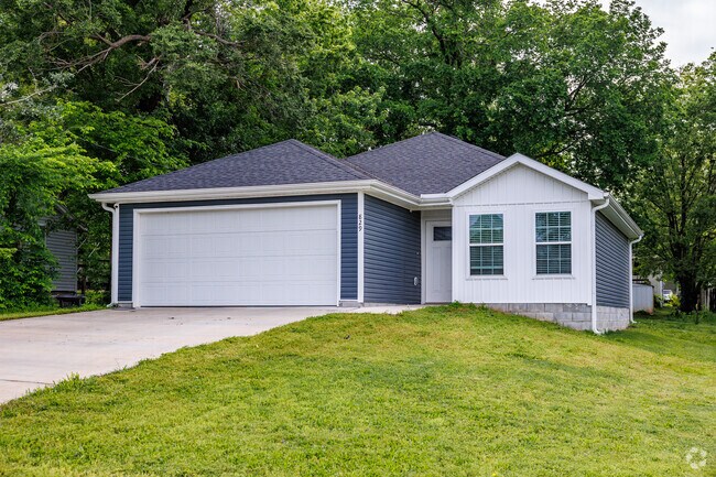 Newer homes in Grand View come with attached two-car garages and paved driveways.
