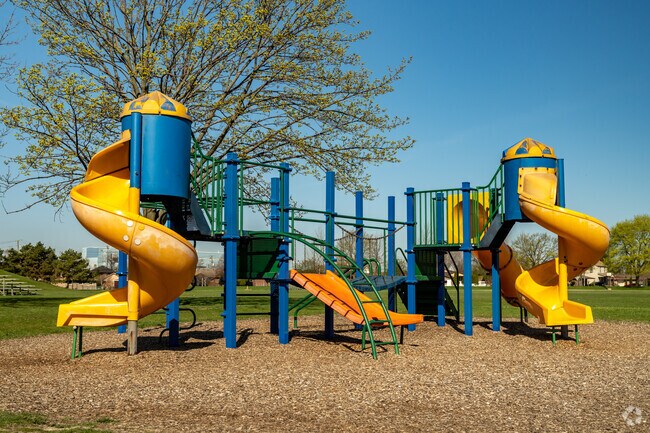 Children love the colorful playground with many slides at CSRD's Lapeer Park.