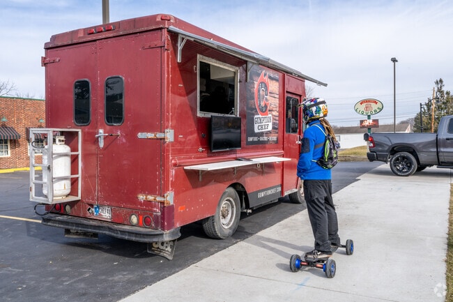 Cruise by the Gumption Chef food truck in Mooresville for great BBQ and comfort food.