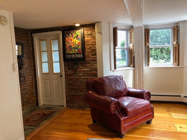 front entrance and LR bay window and leather chair