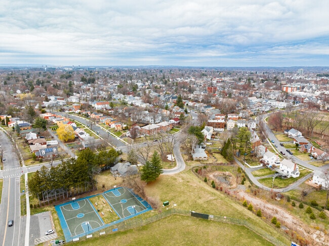Enjoy the beautiful nature around Babe Ruth Playground in the Pine Hills community.