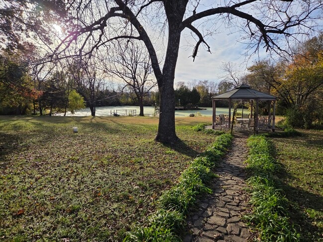 Located on secluded 14 acres of land right in Bartlesville