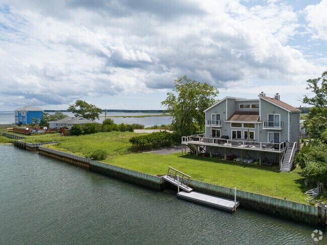 These waterfront homes in Westhampton has a 360 view of the Bay.