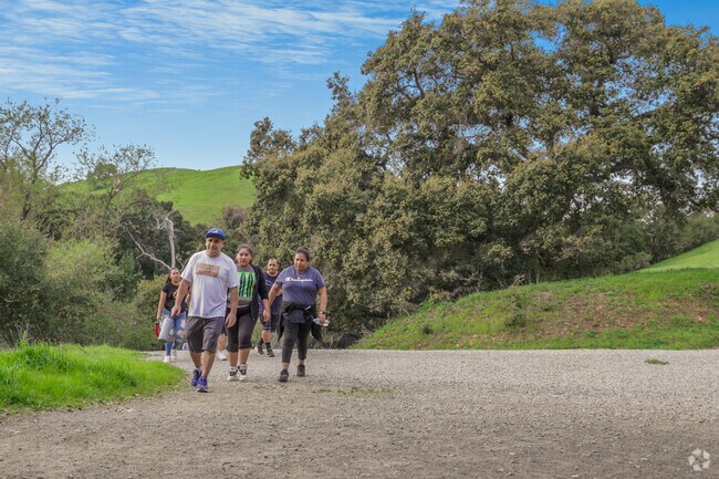 A family cherishes an afternoon walk in Dry Creek Parks near Fairway Park.